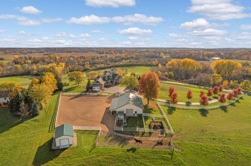 Perched atop nine breathtaking acres overlooking the rolling hills of Minnetrista, this exceptional countryside estate offers a rare combination of luxury living, privacy, and premier equestrian amenities.