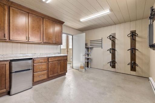 The tack room is nicely outfitted with cabinets, countertops, saddle racks & bridal racks. The barn is meticuoulsly maintained and has great storage space throughout.