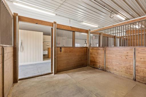 Three large box stalls, rubber mats & high powered fans for the horses. Ethernet/Wi-Fi/Nest cameras in barn for 24/7 monitoring of horses make this a premier set up for any horse enthusiast.