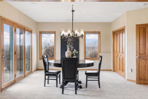 Amusment room is 18 x 16 and easily accommodates pool table and games along with closet for additional storage.