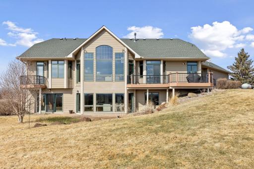 Walls of windows on entire backside of the home that face south illuminate the home with natural light year round!