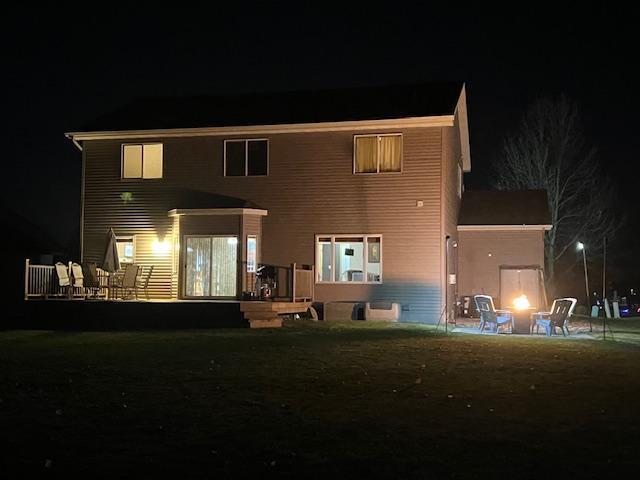 Rear yard deck and patio evening views.jpg
