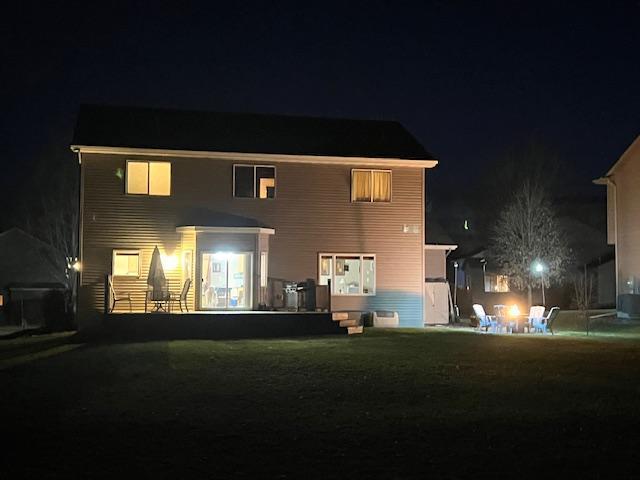 Rear yard evening views, mostly level yard with 6 zone sprinkler system