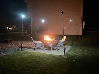 Newly installed private patio with solar light poles.jpg