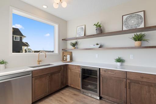 Large butler's pantry with beverage ref and dishwasher