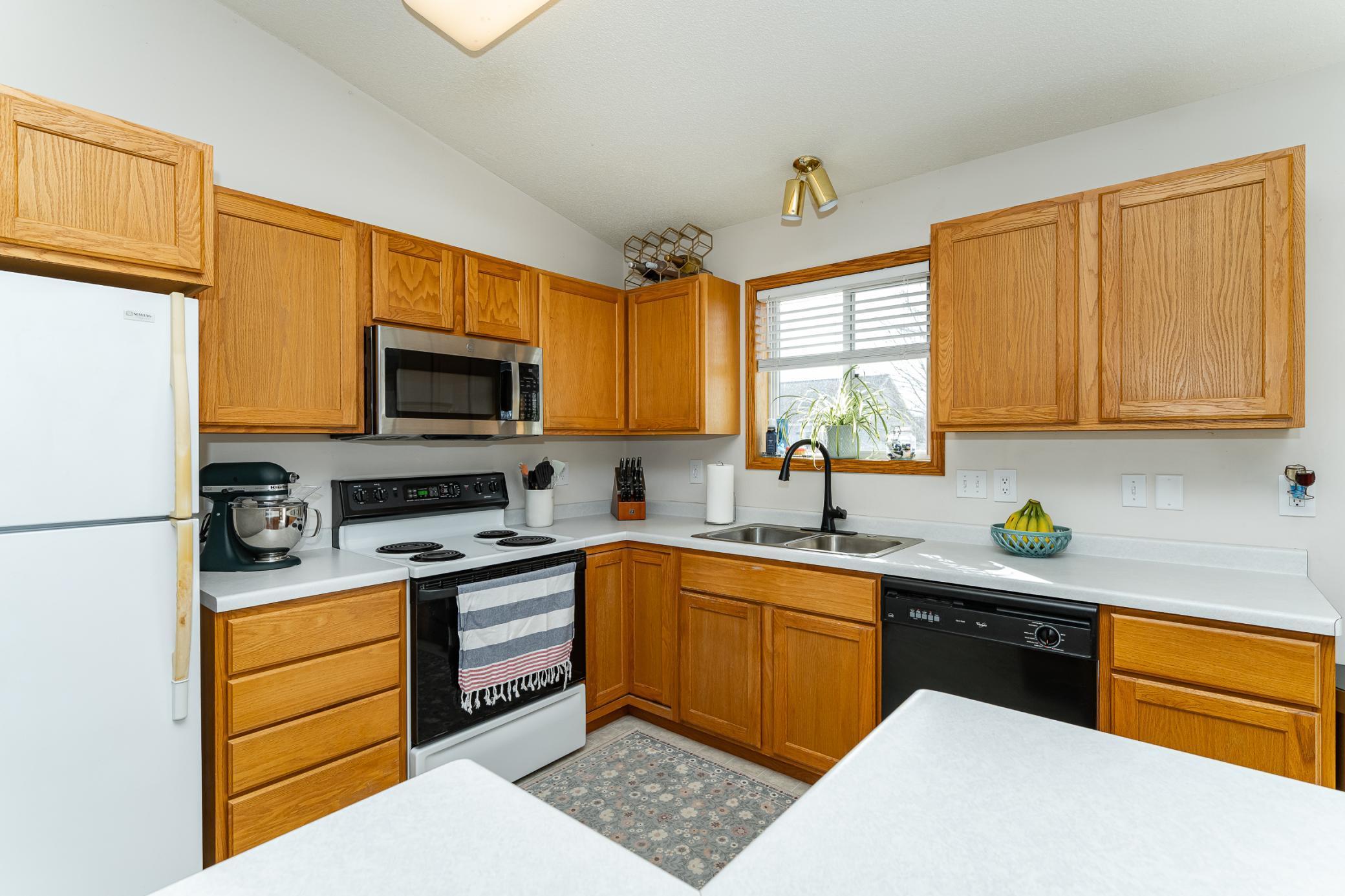 Kitchen window overlooking backyard.jpg
