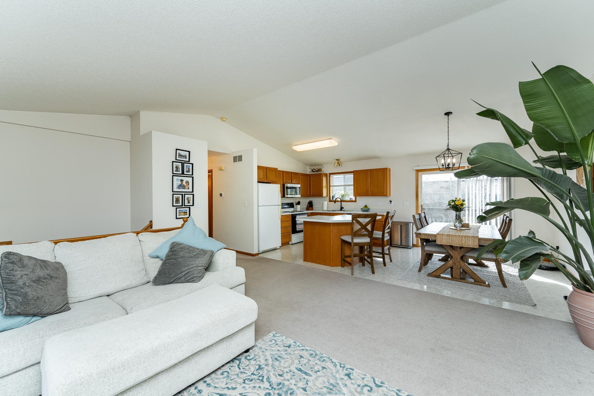 Living room view into kitchen and dining.jpg