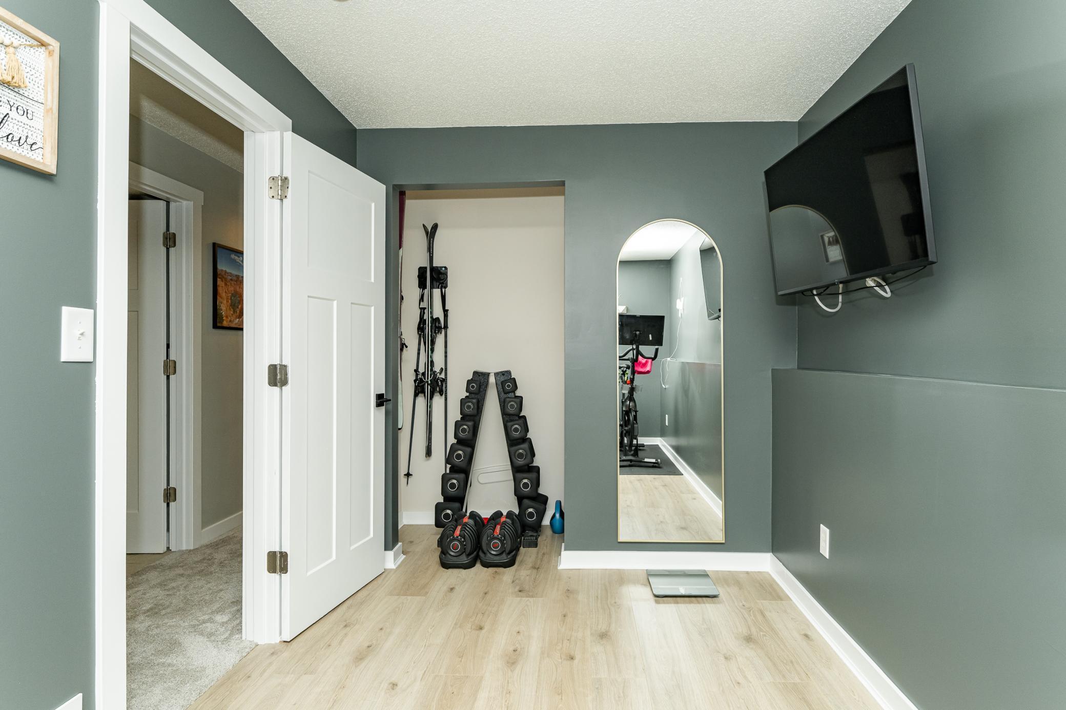 Lower level bedroom 4/gym space.jpg