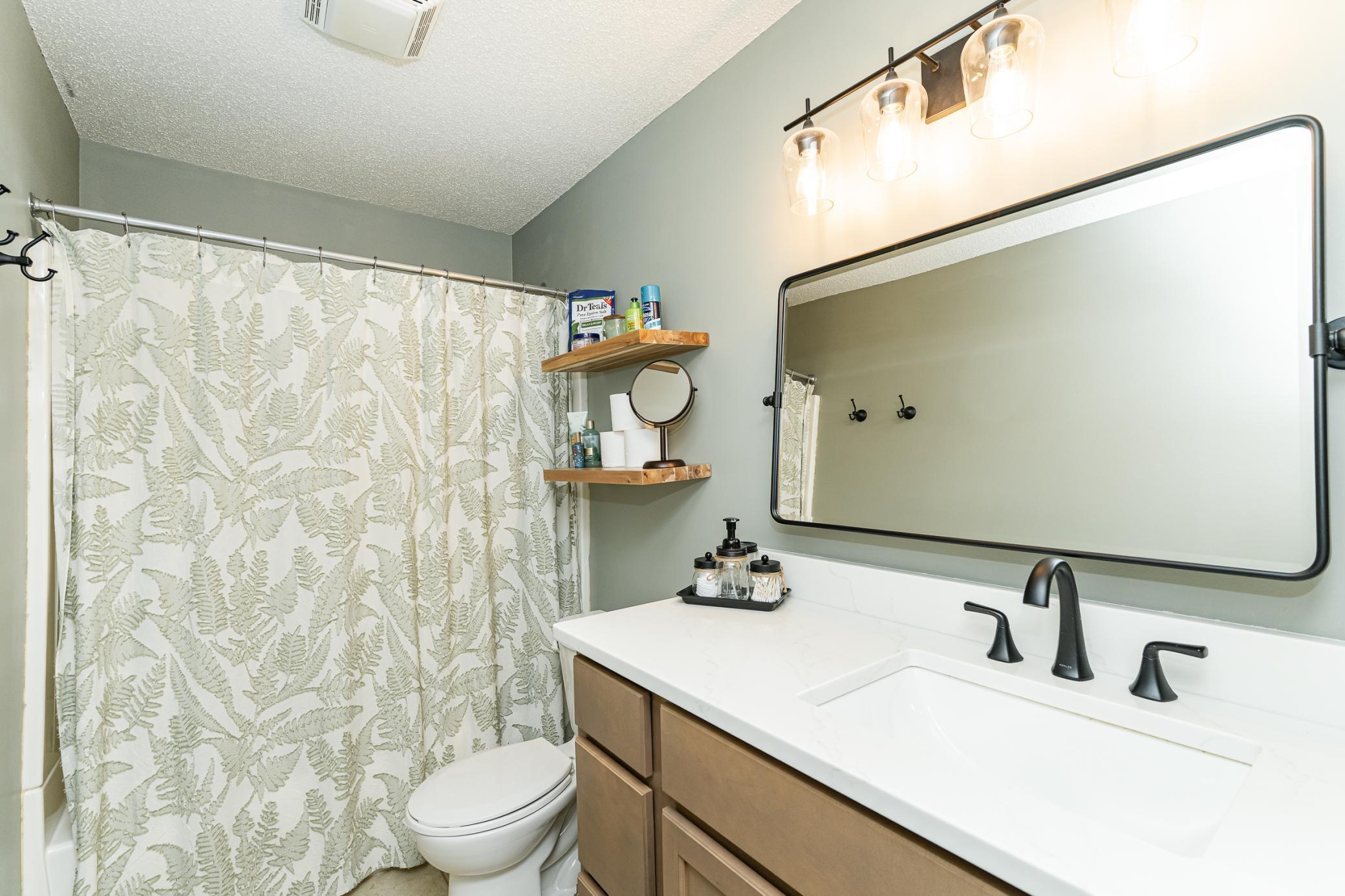 Lower level updated full bathroom.jpg