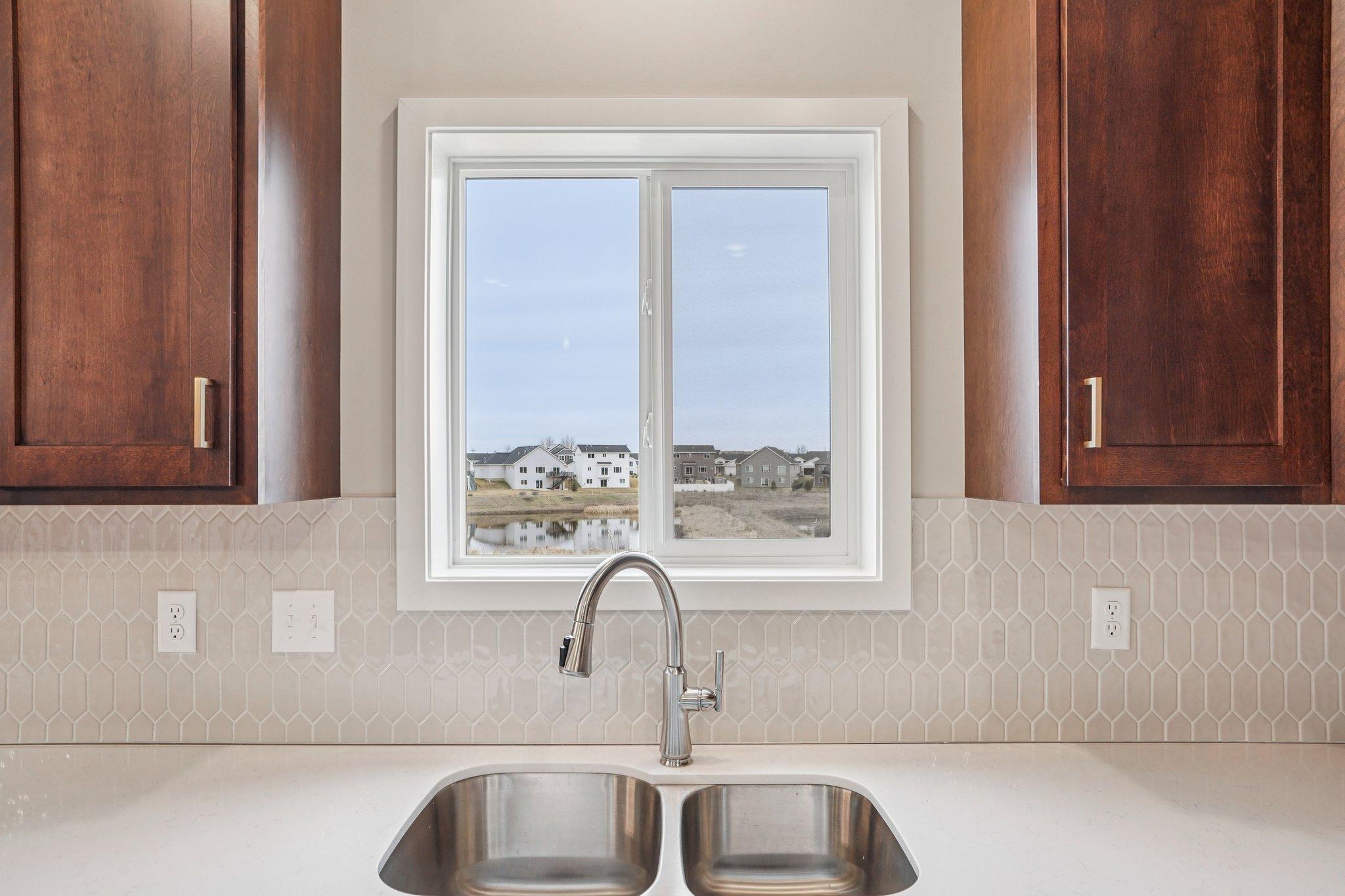 Kitchen window for additional natural light.