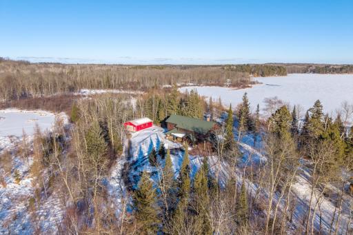 Year-round lake house w/33 acres and adjoins county and state land!