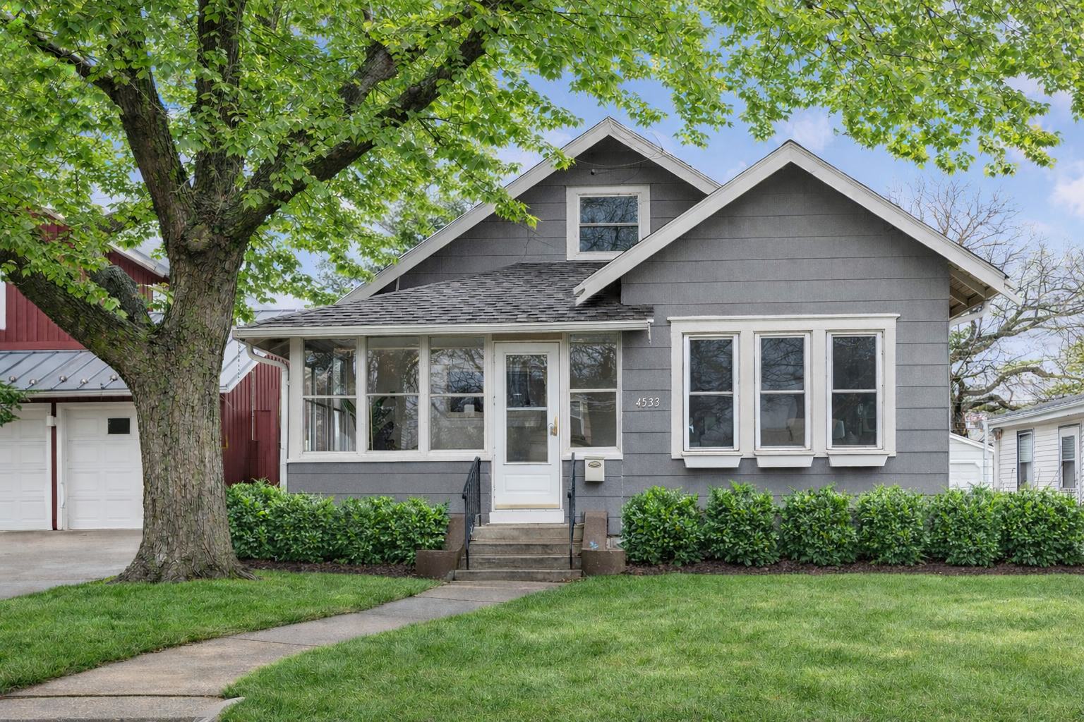 Rendering of house with new paint and plantings.