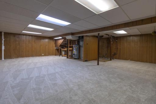 Drain tiled basement has brand new carpeting just waiting for your finishing touches