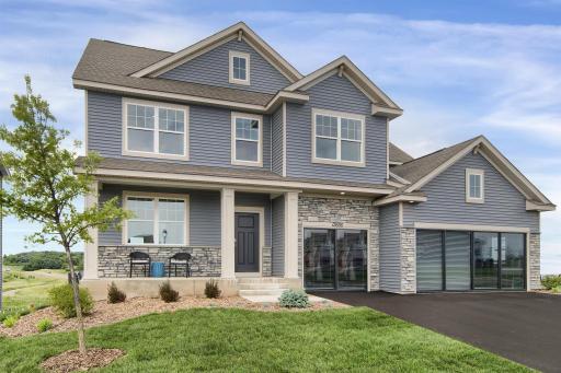 Welcome home to the Whitney American Classic at Caramore Crossing by D.R. Horton! Photo of Model home, selections and finishes to vary.