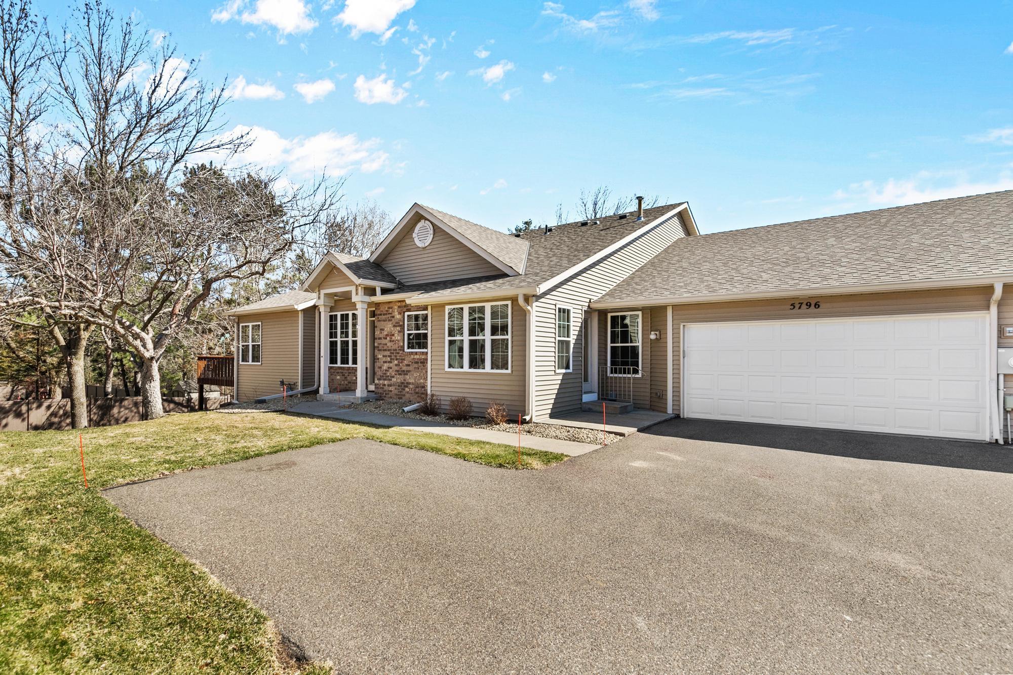 Large double garage with guest parking area