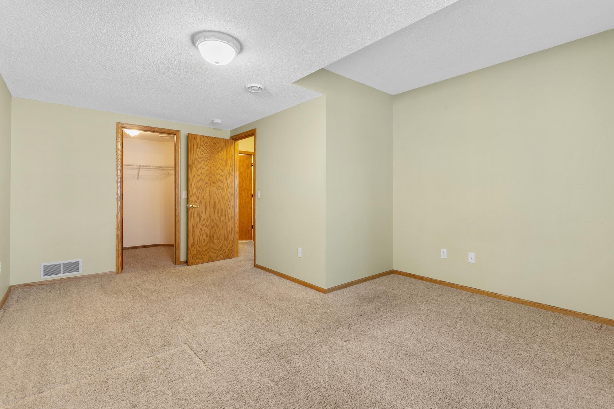 Walk in closet in 3rd bedroom