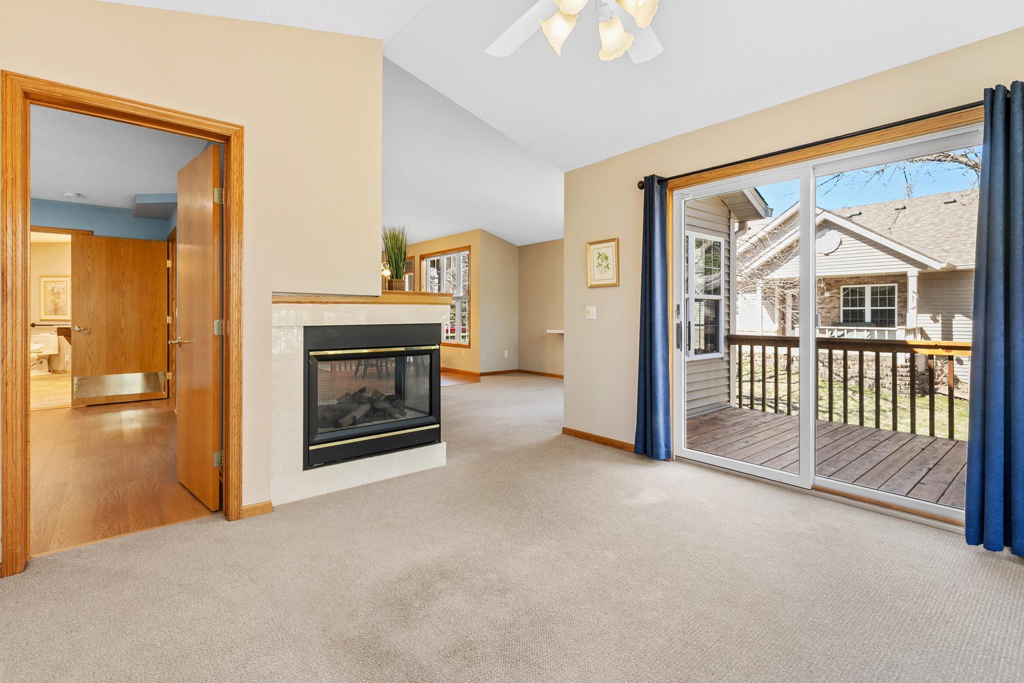 Sunroom with deck and primary bedroom access