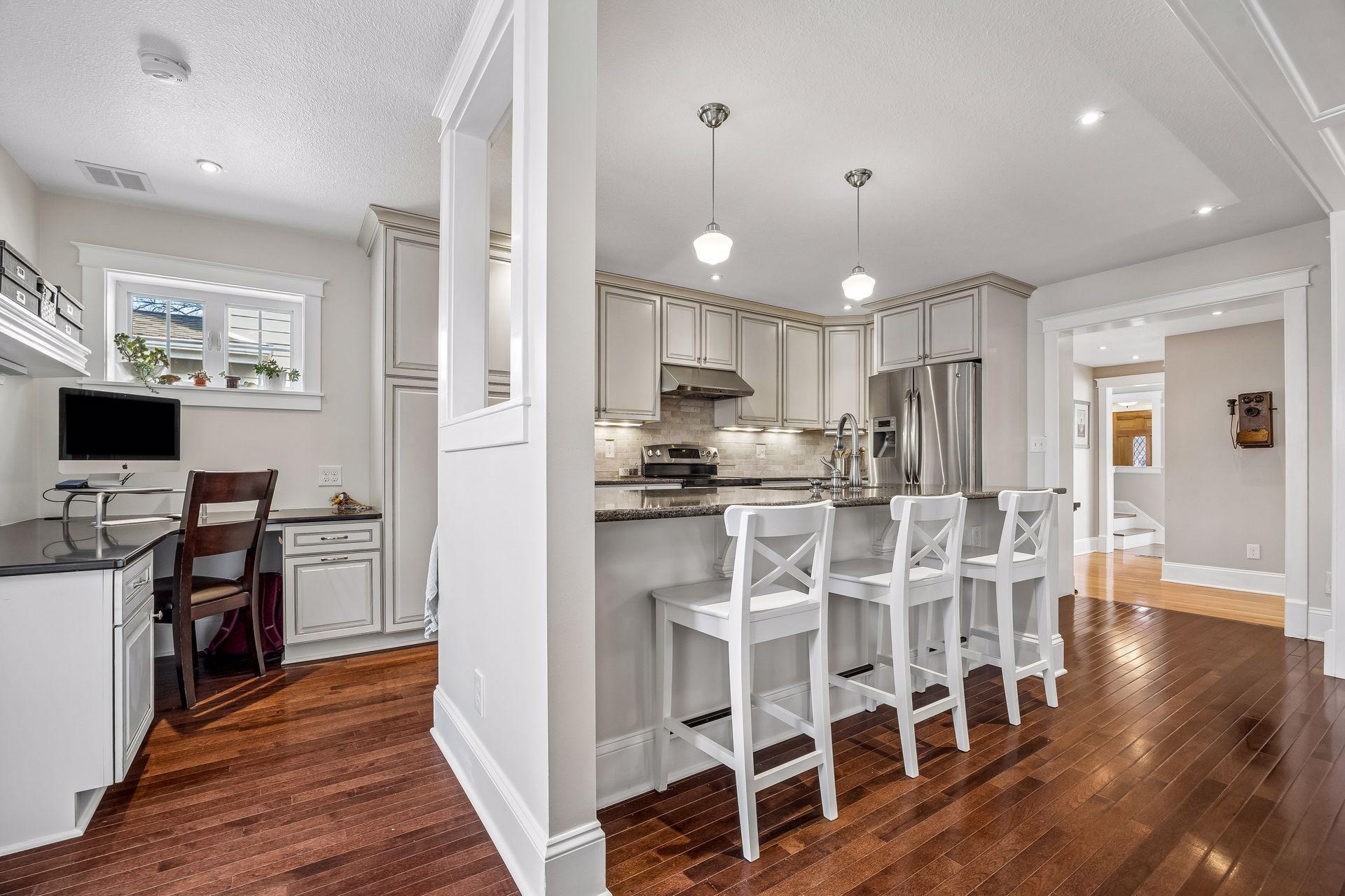 Functional office, seamlessly integrated off of the kitchen.