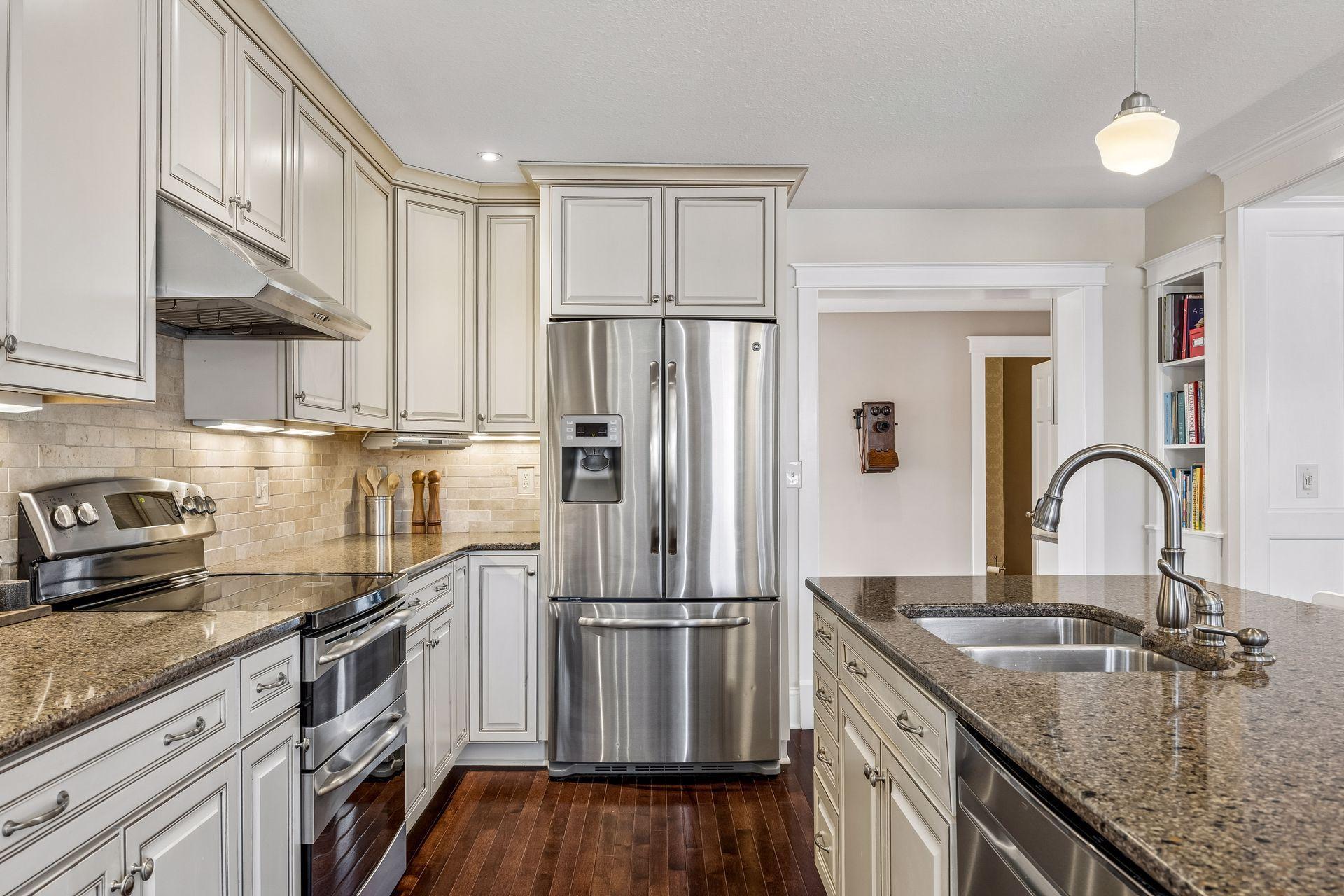 Stainless steel appliances bring a polished, modern feel to this inviting and functional kitchen.