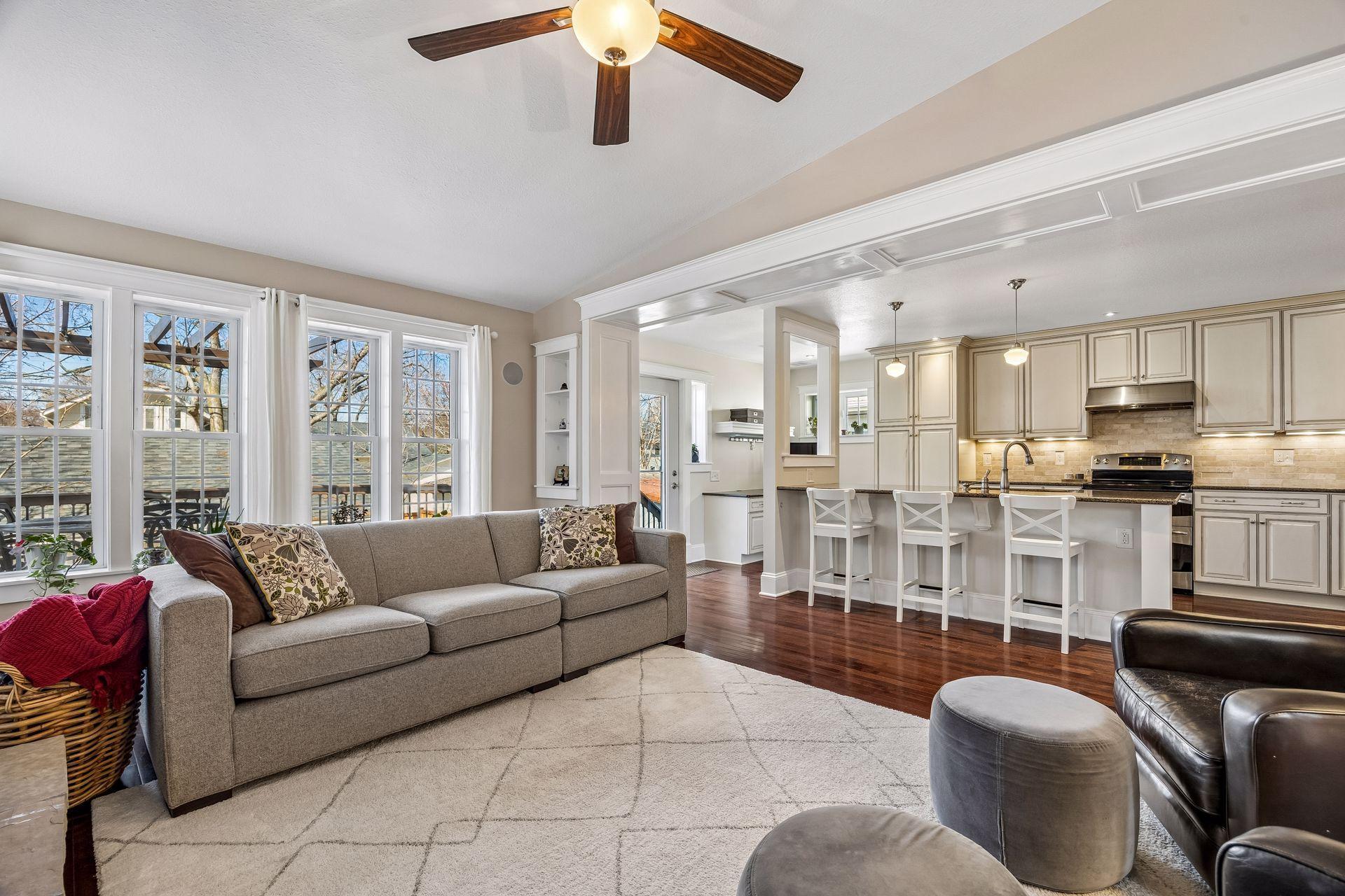 Kitchen opens to bright and airy great room.