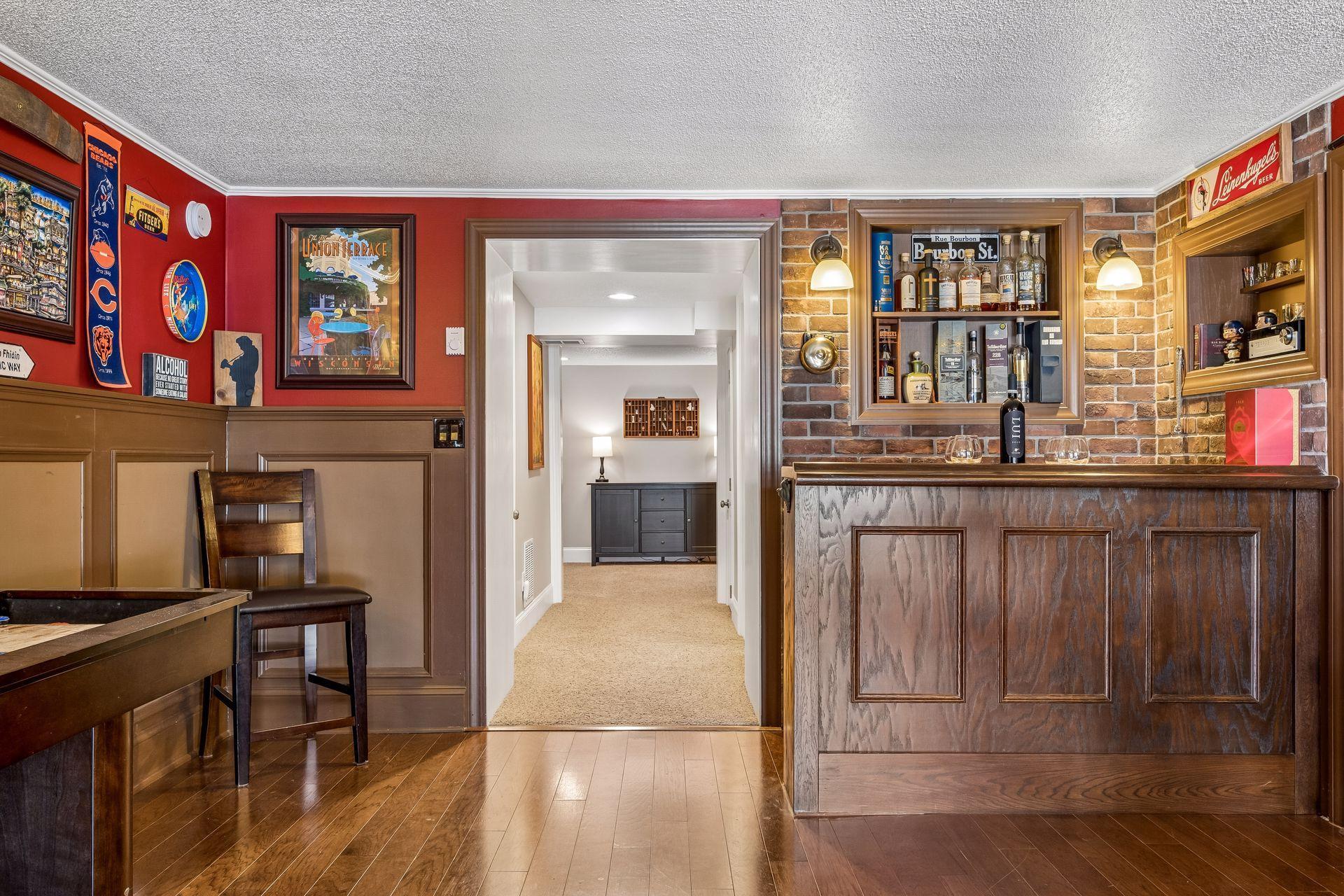 Paneled, hardwood floors, dry bar- ready to go!