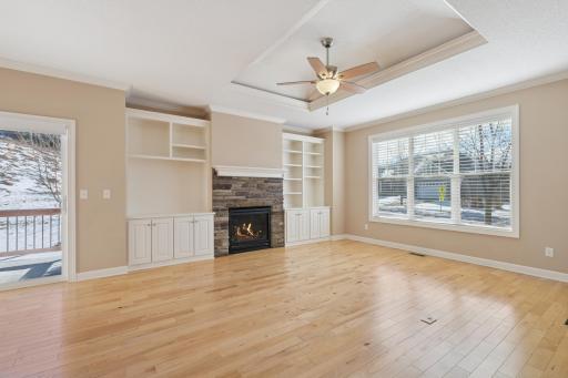 Gas burning fireplace with pretty built-ins