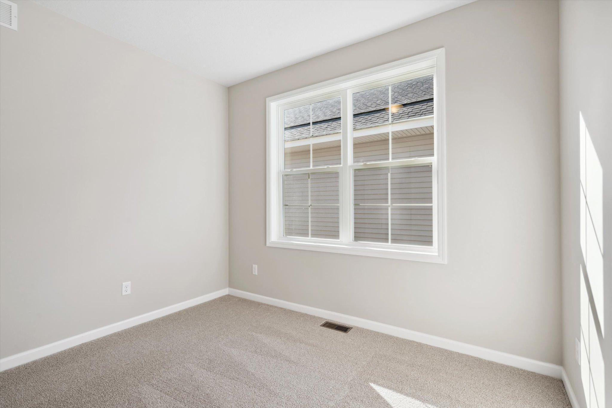 Bedroom #2 *Photo of a previously built home of the same floor plan. Finishes/options may vary.