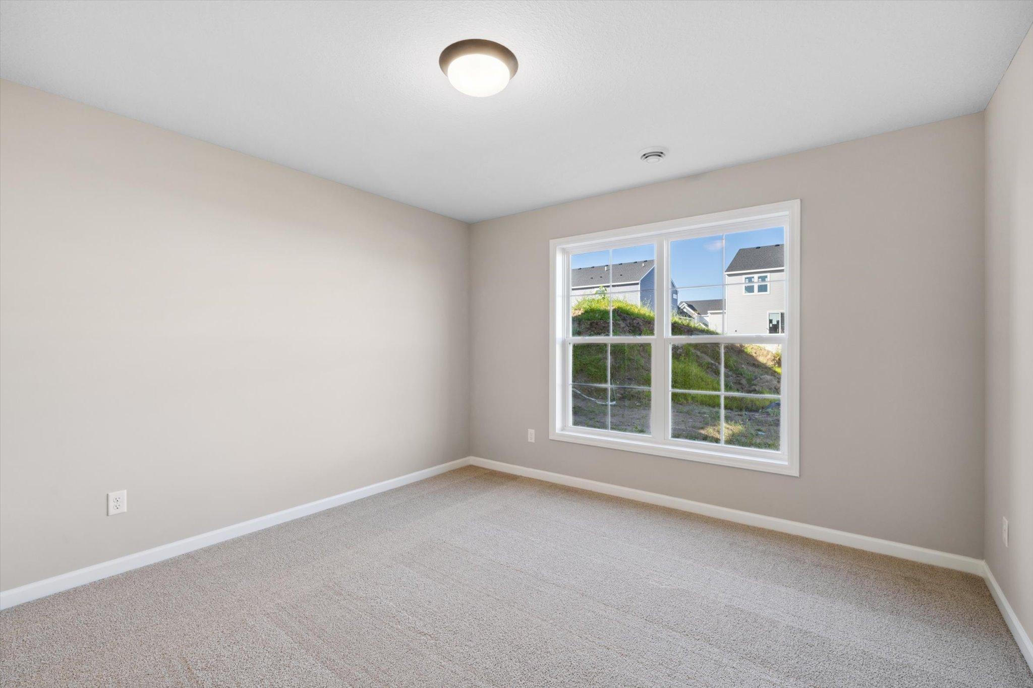 Bedroom #3 *Photo of a previously built home of the same floor plan. Finishes/options may vary.