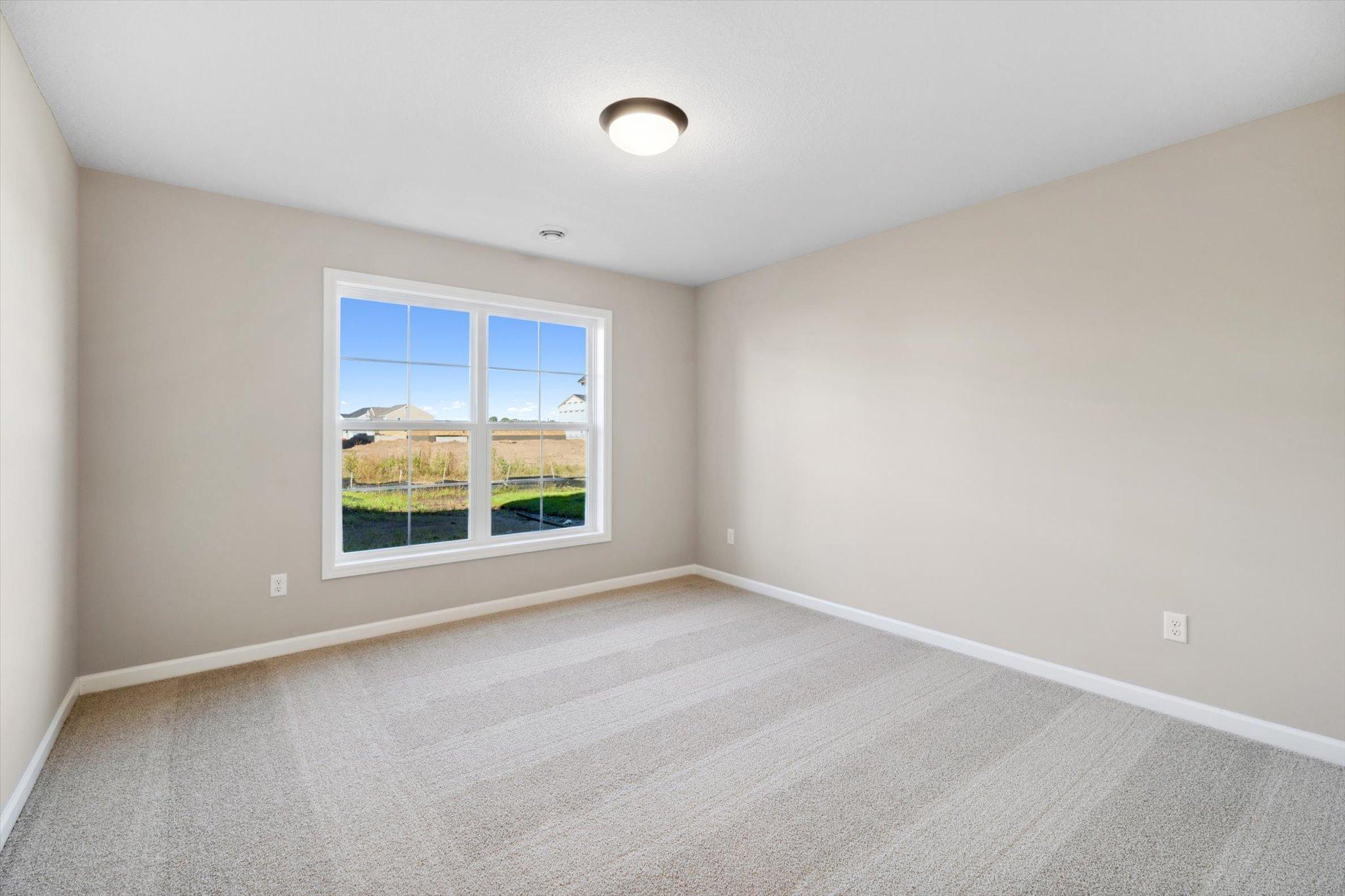 Bedroom #3 *Photo of a previously built home of the same floor plan. Finishes/options may vary.
