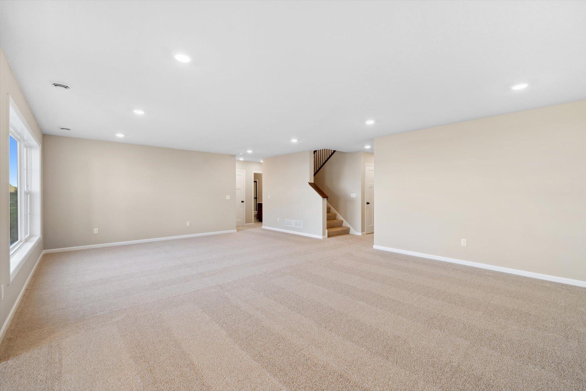 Lower Level Rec Room *Photo of a previously built home of the same floor plan. Finishes/options may vary.
