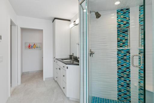 Primary bathroom has his and hers counters, heated flooring and a bidet.