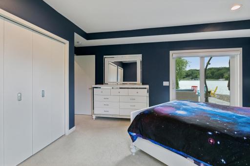 This walk out bedroom offers its own private slide doors to the patio area.