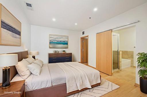 Primary bedroom w/ full bath