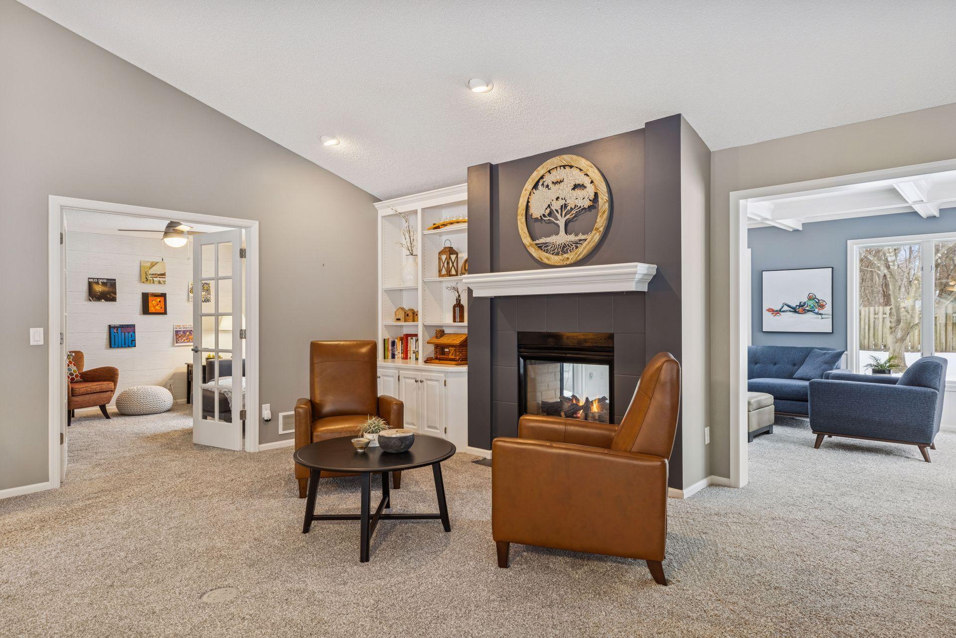Living Room w/ Flex Room to the Left and Sunroom to the Right