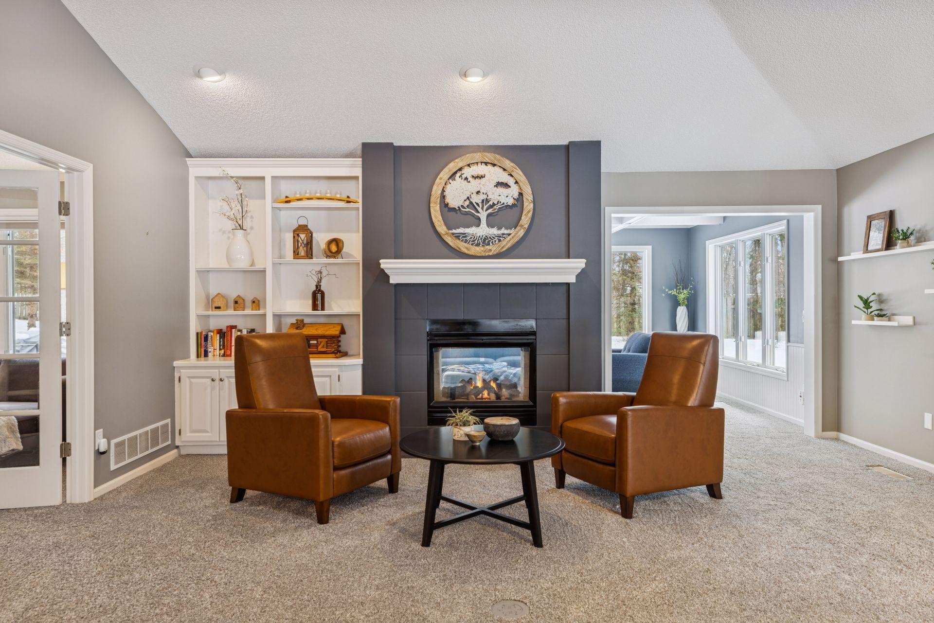 Living Room with 2-Sided Fireplace and Built-Ins