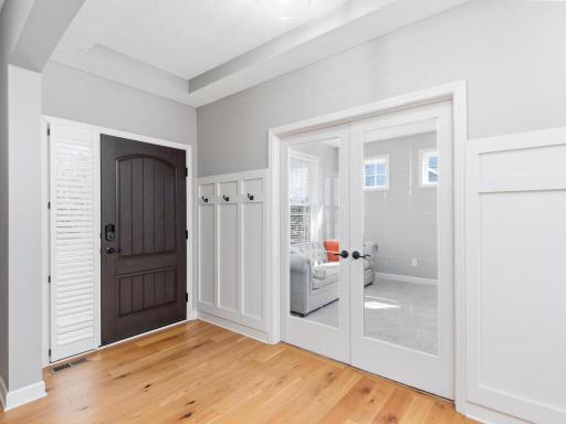 Greet your guests in the bright, beautiful & welcoming entryway, filled with impressive architectural features & quality finishes.