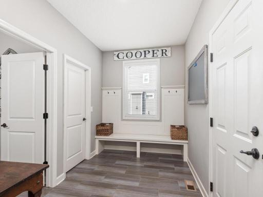 Thoughtfully planned and generously sized, this mudroom keeps the home running smoothly while providing a clean, stylish transition from outdoors to in.