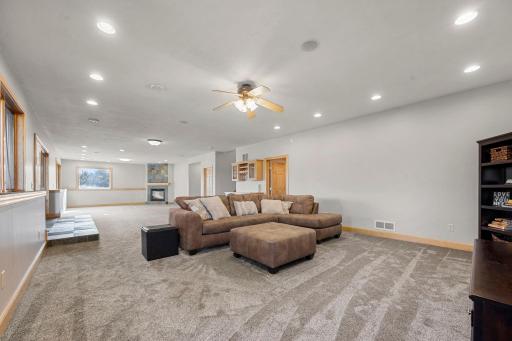 Family Room - Lower Level (flame in fireplace is digitally enhanced)