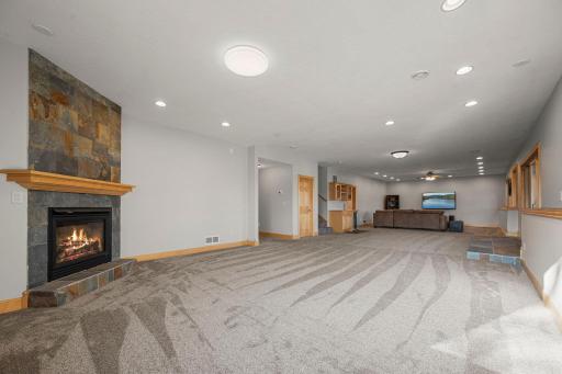 Family Room - Lower Level (flame in fireplace is digitally enhanced)