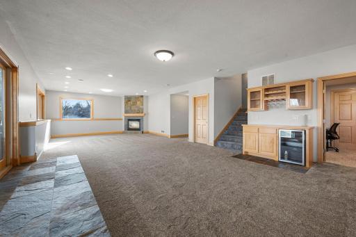 Family Room - Lower Level (flame in fireplace is digitally enhanced)