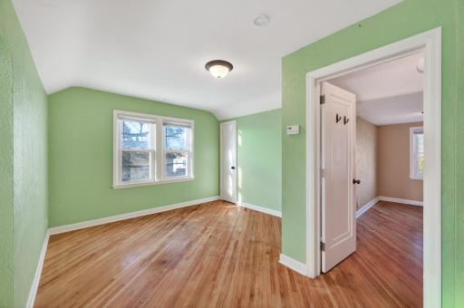 Additional space in the primary suite makes for the perfect reading nook or office