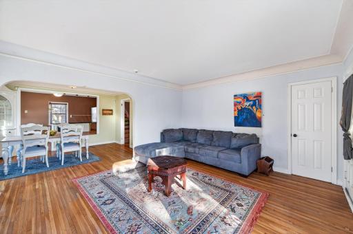 The spacious living room also includes an entryway closet!
