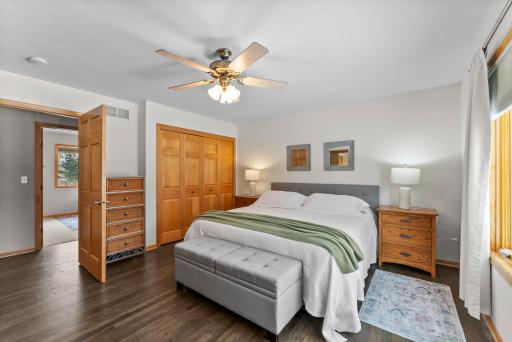 Three bedrooms are conveniently located on the main level. The spacious primary suite includes a ceiling fan and an attached full bathroom.