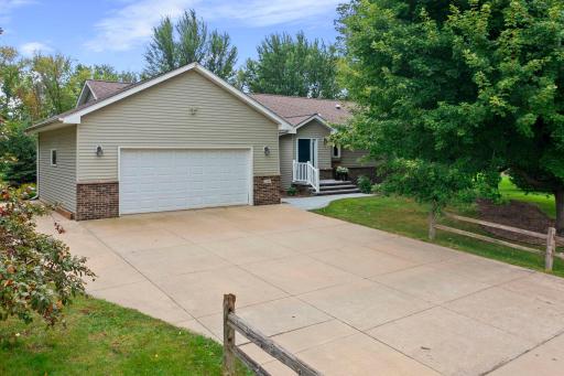 Additional exterior highlights include an attached two-car garage and a basement sump pump with a backup system for added peace of mind.