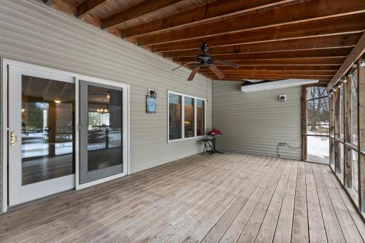Outside, the home continues to impress with a generously sized screened-in covered porch and ceiling fan.