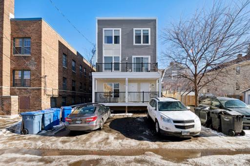 3 off-street arking spaces behind building.