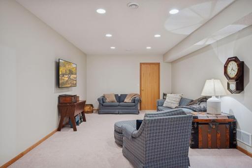 Family room with recessed lighting and beautiful wood finishes