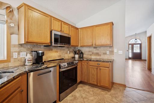 New Stainless-Steel Appliances, Refrigerator, and Updated Backsplash