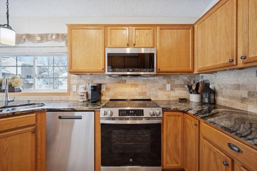 Kitchen window and walk out patio door (flat lot)
