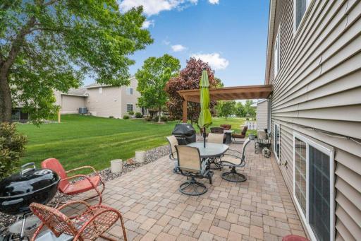 Spring photo of the yard with pergola recently stained!